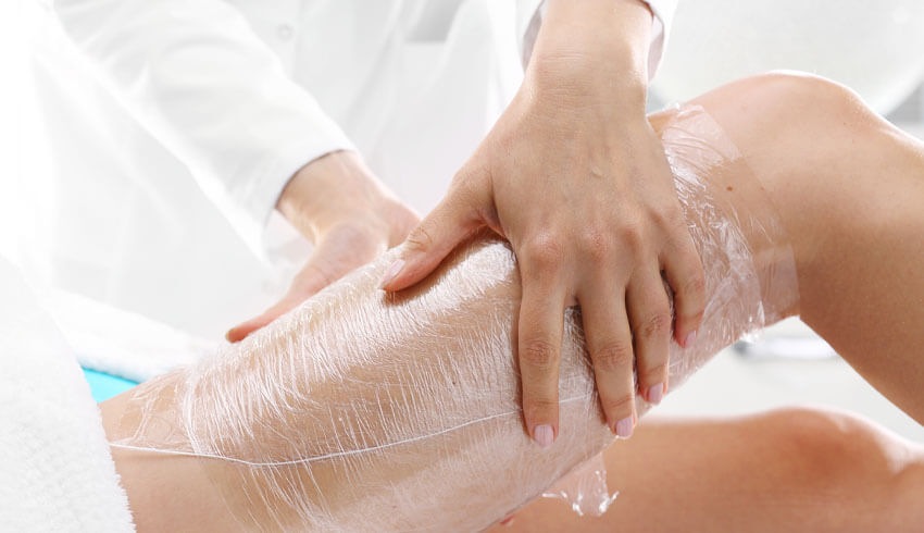 Body wrap treatment on the thigh